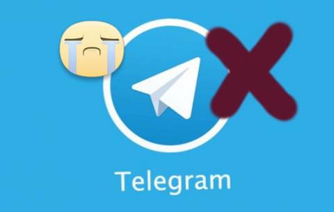 Immagine raffigurante l'icona di Telegram con una croce ed una faccina che piange